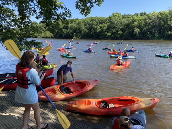 Group of kayakers on the Cape Fear River at launch in Lillington, NC